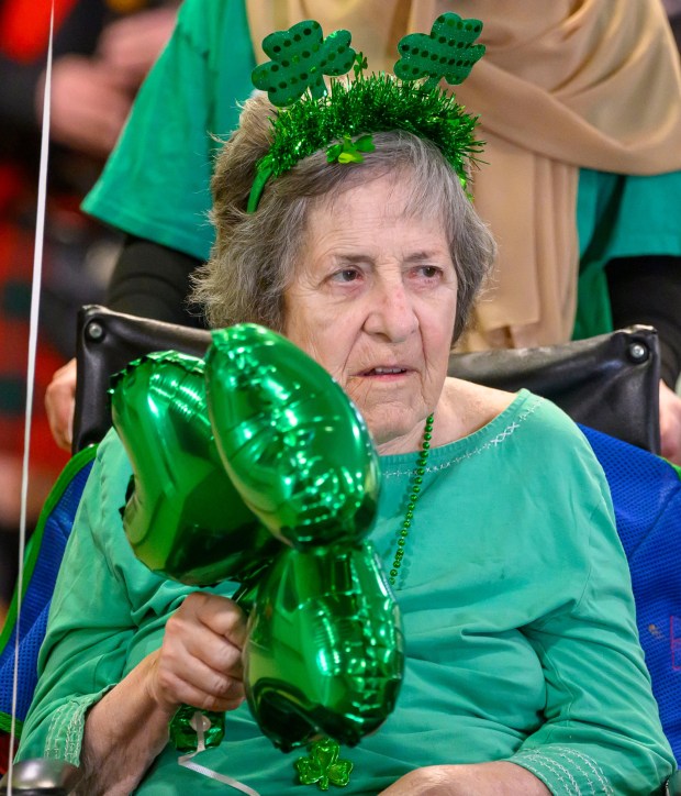 Karen, a resident at Arden Courts Old Orchard memory care community in Bethlehem Township,  is in the festive spirit Tuesday, March 17, 2026, during a St. Patrick's Day celebration at Arden Courts Old Orchard, a memory care community, in Bethlehem Township. (April Gamiz/The Morning Call)
