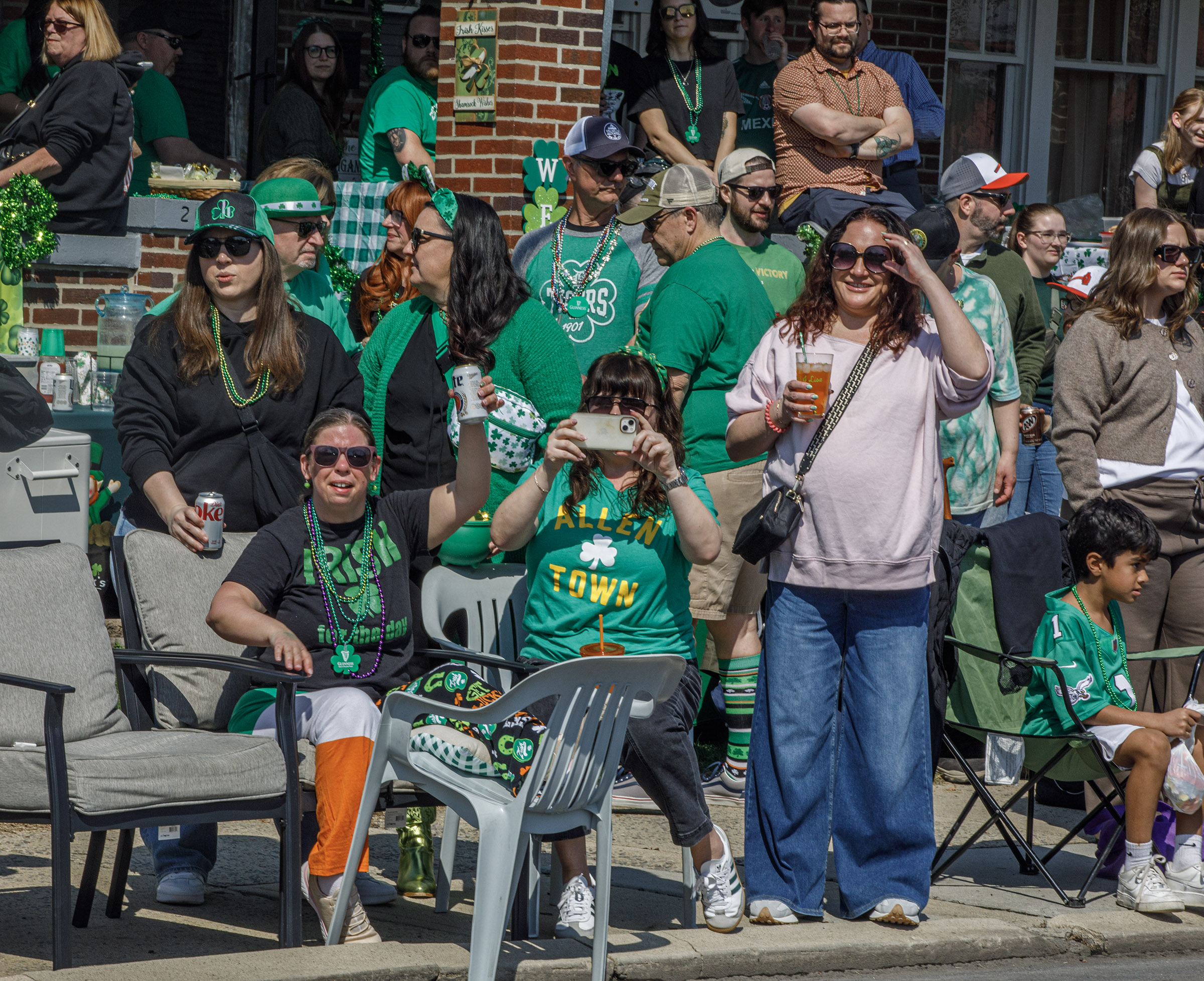People attend the St. Patrickâs Parade on Sunday, March 22,...