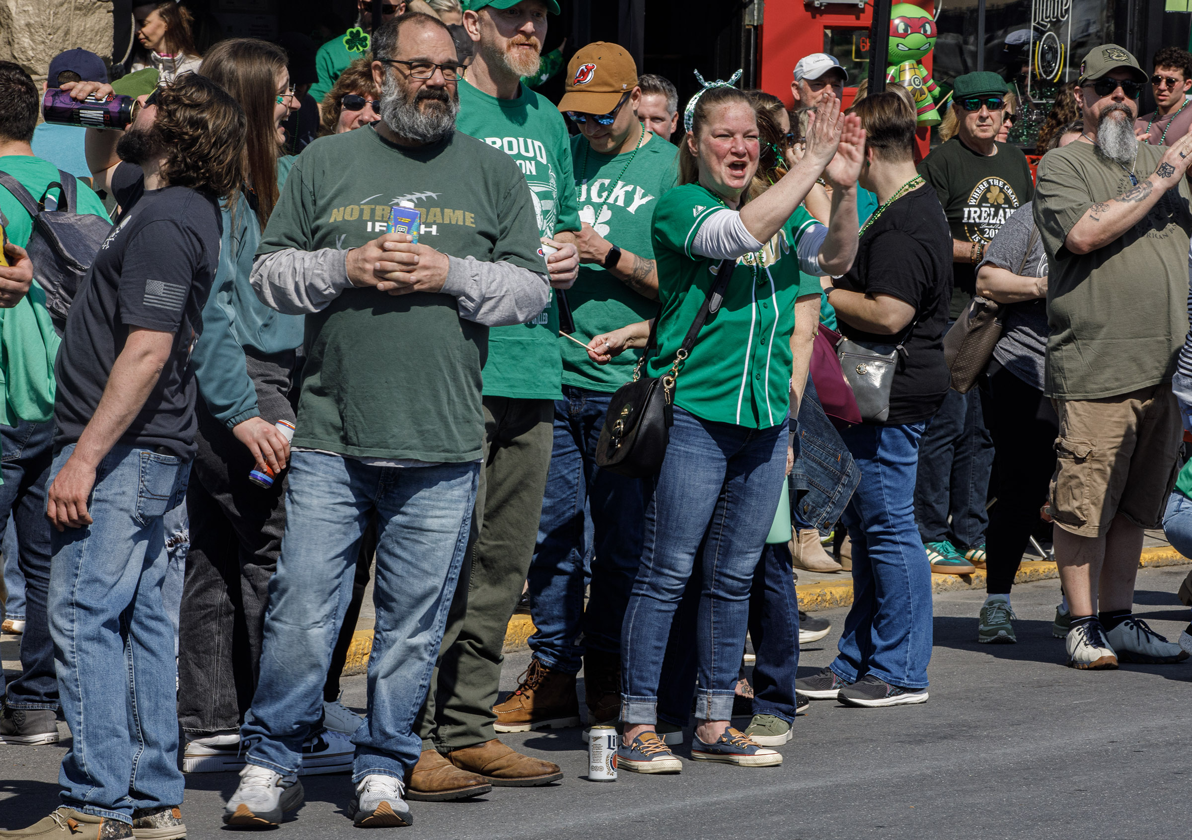 People attend the St. Patrickâs Parade on Sunday, March 22,...