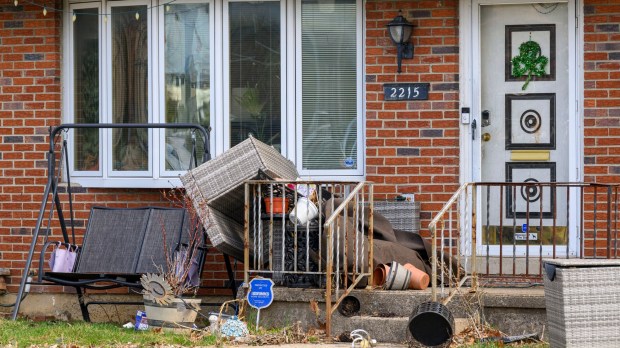 Damage is seen Tuesday, March 17, 2026, on South 12th Street in Allentown by Monday night's strong winds. Storms blew off roofs and downed trees and power lines around the Lehigh Valley, leaving thousands without electricity. (April Gamiz/The Morning Call)