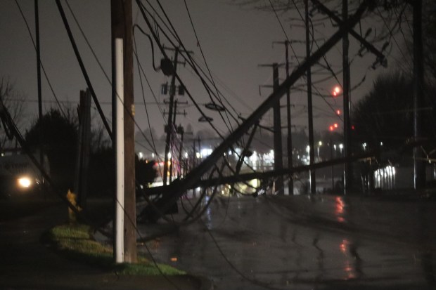 Storms bring strong winds late night Monday, March 16, 2026, on South 12th and Downyflake Lane in Allentown, downing trees and wires, and leading to widespread power outages. (Rich Rolen/Special to The Morning Call)