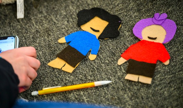 Third graders create a story and puppets with the help of Moravian University students Monday, March 2, 2026, at William Penn Elementary School in Bethlehem, where Moravian University students are running a story workshop for third graders. The university students, part of Moravian's art and child development education course, are using puppets to engage the third graders in shaping characters and themes for original children's books. (April Gamiz/The Morning Call)