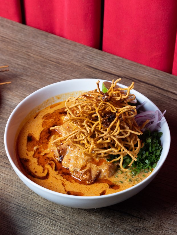 Khao soi, made with a blend of red and green curries, at Mawn in Philadelphia, Feb. 28, 2026. (Yuvraj Khanna/for The New York Times)