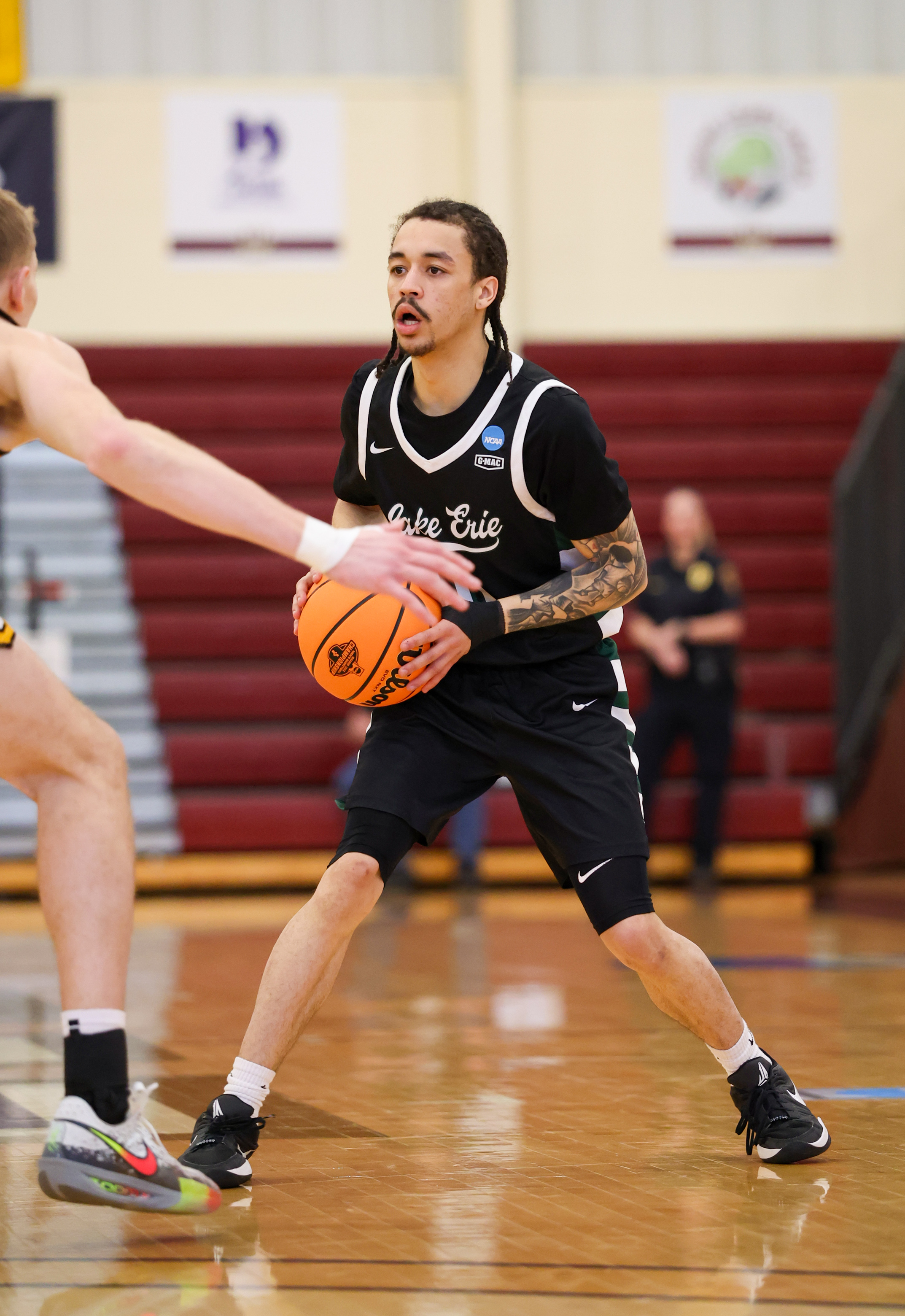 Photos from Lake Erie College vs. Michigan Tech men's basketball,...