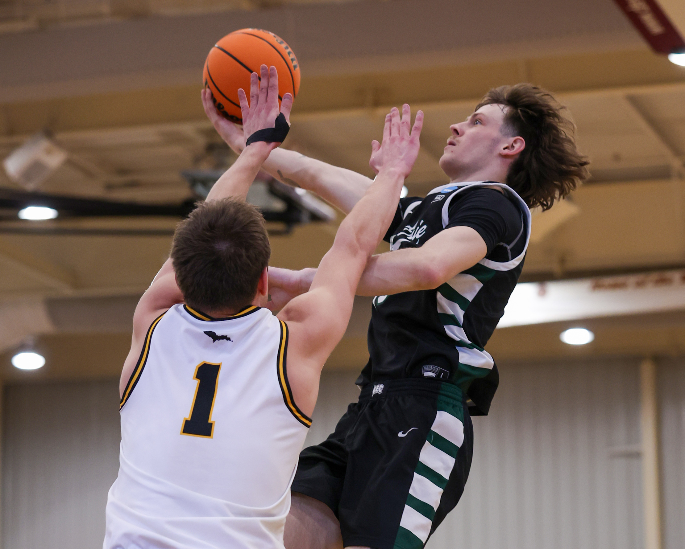 Photos from Lake Erie College vs. Michigan Tech men's basketball,...
