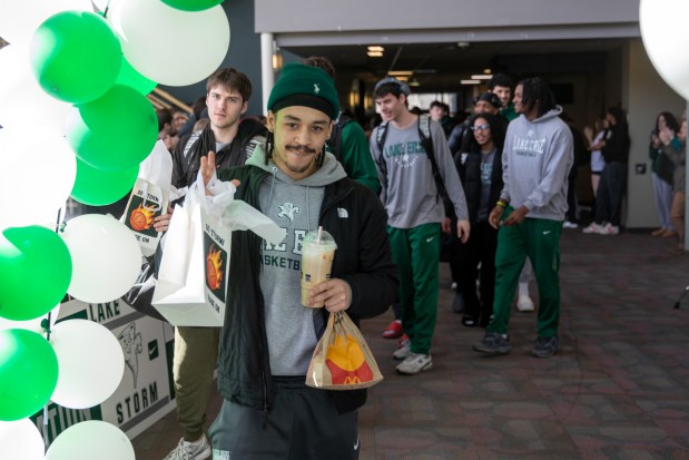 Lake Erie College's Trace Bishko of Brush and the rest of the Storm players get a send-off March 12 at LEC's Athletic Center before heading to Canton for the Midwest Regional beginning on March 14. (News-Herald Staff)