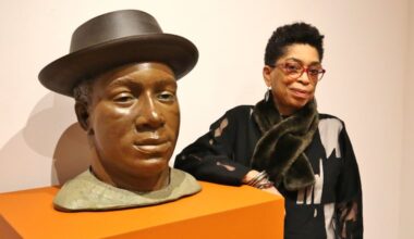 Syd Carpenter with a bust of her brother Frank, one of the sculptures in the Woodmere Museum's show â€œSyd Carpenter: Planting in Place, Time, and Memory"