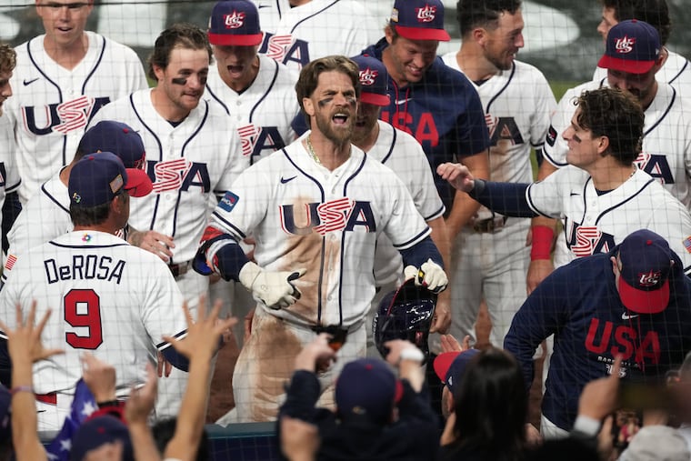 Bryce Harper celebrates after hitting a two-run home run during the eighth inning in the World Baseball Classic title game against Venezuela.
