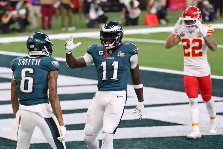 Feb 9, 2025; New Orleans, LA, USA; Philadelphia Eagles wide receiver A.J. Brown (11) congratulates wide receiver DeVonta Smith (6) after he scored a touchdown against the Kansas City Chiefs during the second half of Super Bowl LIX at Caesars Superdome. Mandatory Credit: Bill Streicher-Imagn Images