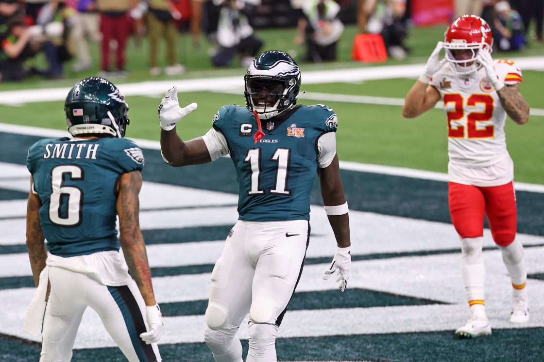 Feb 9, 2025; New Orleans, LA, USA; Philadelphia Eagles wide receiver A.J. Brown (11) congratulates wide receiver DeVonta Smith (6) after he scored a touchdown against the Kansas City Chiefs during the second half of Super Bowl LIX at Caesars Superdome. Mandatory Credit: Bill Streicher-Imagn Images