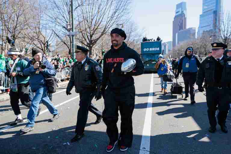 Feb 14, 2025; Philadelphia, PA, USA; Philadelphia Eagles quarterback Jalen Hurts (1) celebrates with the Lombardi Trophy during the Super Bowl LIX championship parade and rally. Mandatory Credit: Caean Couto-Imagn Images