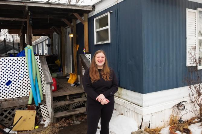 Candace May stands outside her home in the Valley View Estates. May and other residents have been told they will be evicted in April.