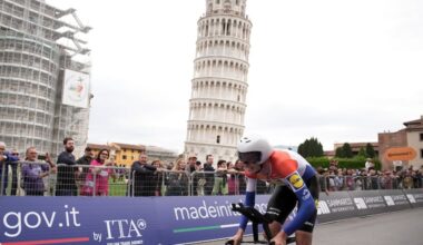 Dutch rider Daan Hoole pedals past the Pisa's leaning Tower during the 10th stage of the Giro d'Italia cycling race, an individual time trial from Lucca to Pisa, Italy, Tuesday, May 20, 2025. (Marco Alpozzi/LaPresse via AP)