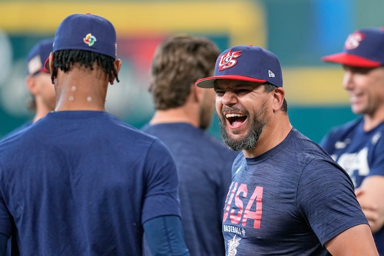 Kyle Schwarber (right) has been lauded for his veteran leadership during Team USA's run to the World Baseball Classic final.