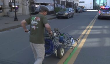 A sure sign of Parade Day in Scranton: 'Irish' Gene Reed paints the parade route
