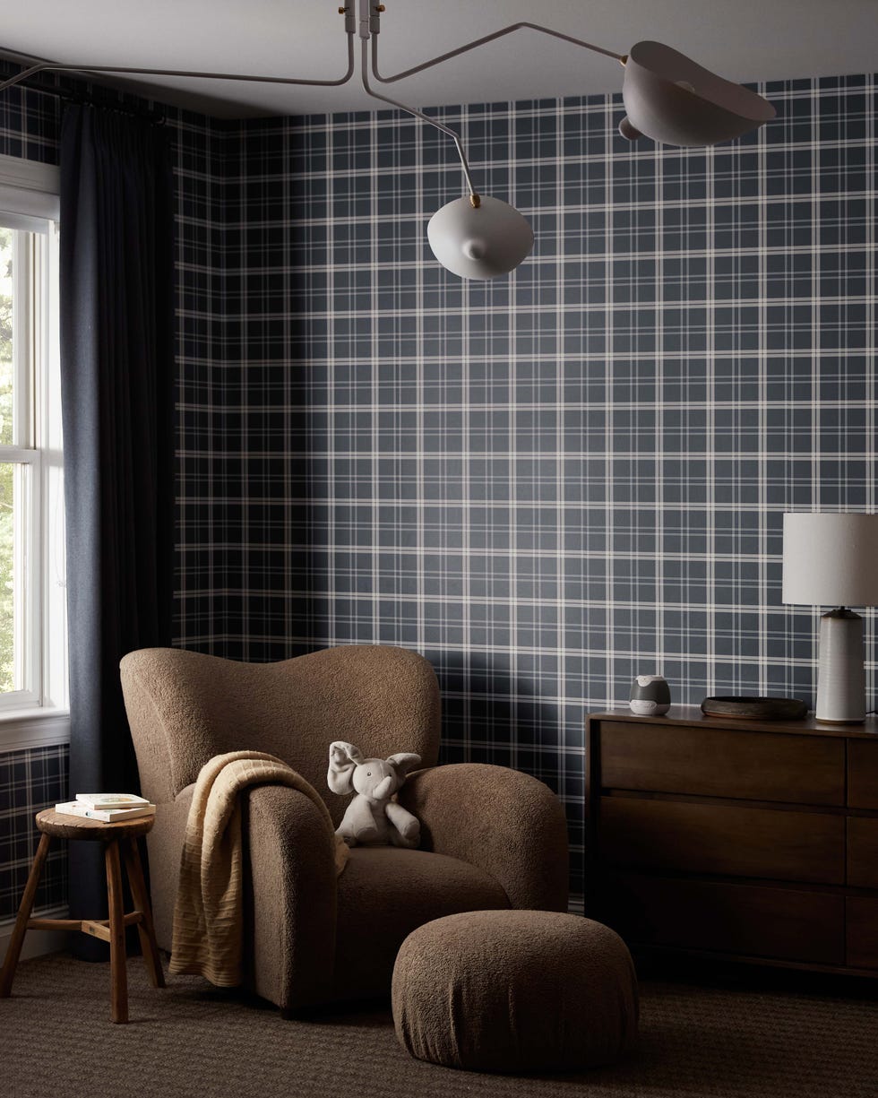 Cozy corner of a room with armchair and side table.