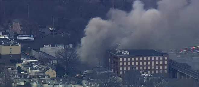 A chocolate factory exploded on Friday in West Reading, Pa., killing two people and trapping nine others.