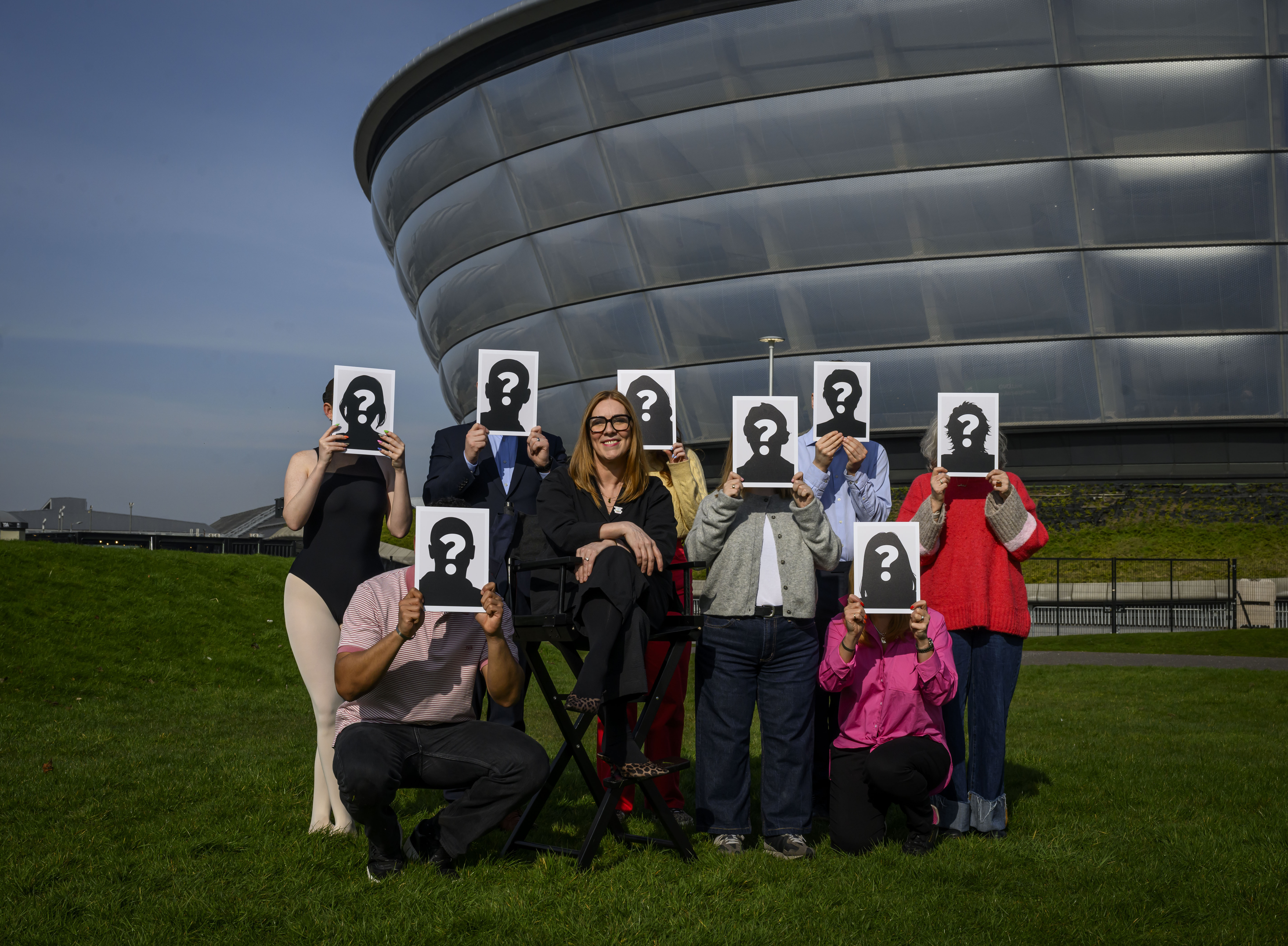 Louisa Mahon, Glasgow 2026's chief marketing officer, with some of the members of the upcoming opening ceremony