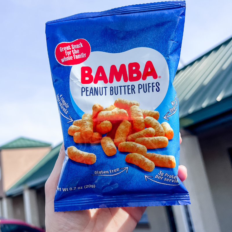 Bamba bag held up in the air