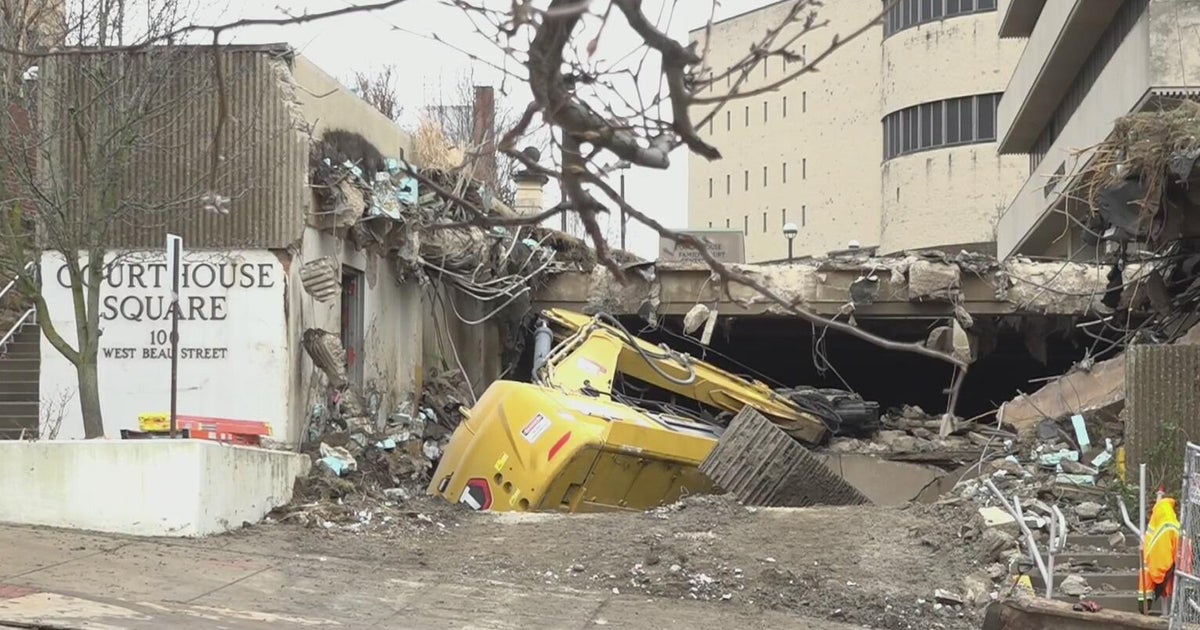 Heavy equipment falls into hole during Washington County demolition project