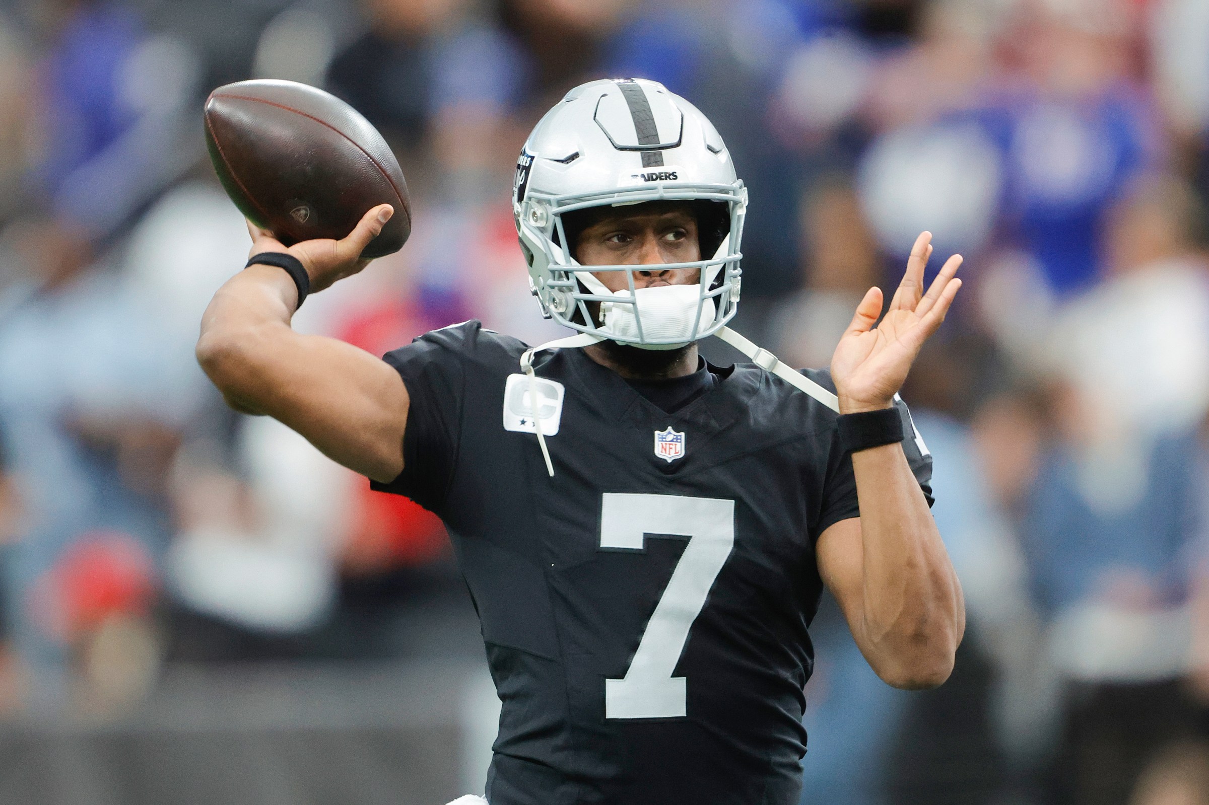 LAS VEGAS, NEVADA - DECEMBER 28: Geno Smith #7 of the Las Vegas Raiders warms up prior to the game against the New York Giants at Allegiant Stadium on December 28, 2025 in Las Vegas, Nevada. (Photo by Steve Marcus/Getty Images)