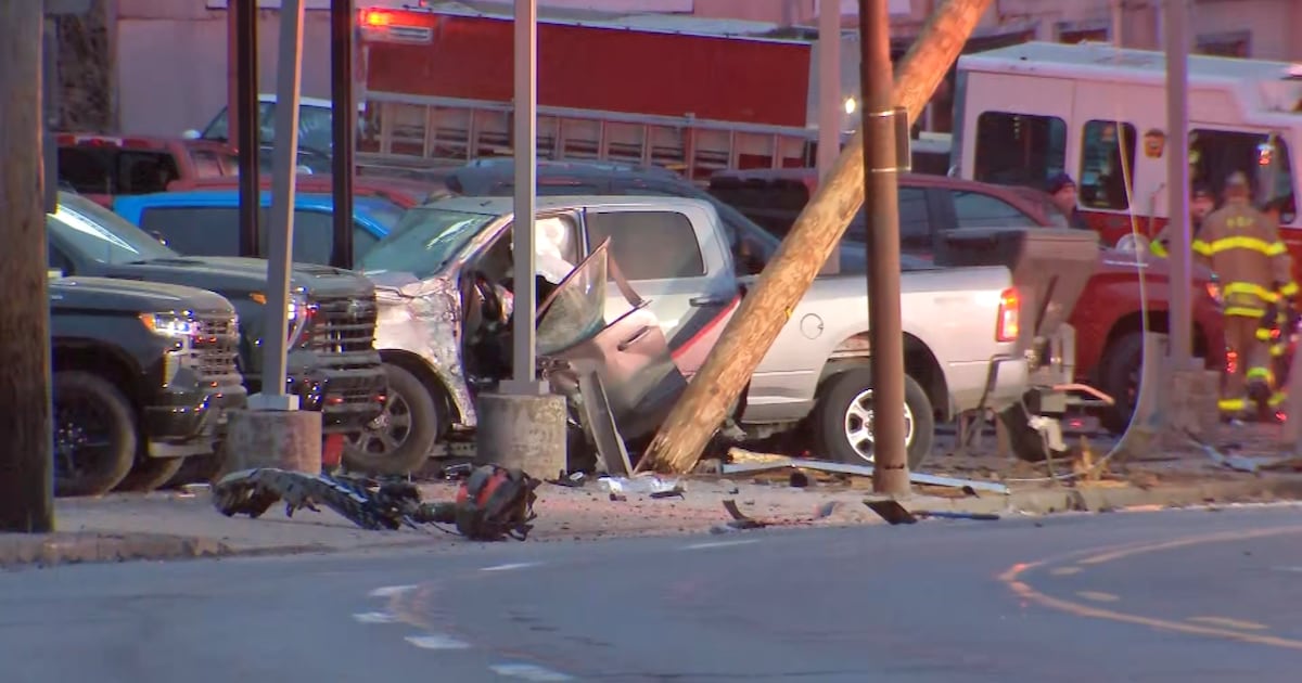 Pickup truck crashes into pole, car dealership parking lot; part of West Liberty Avenue shut down – WPXI