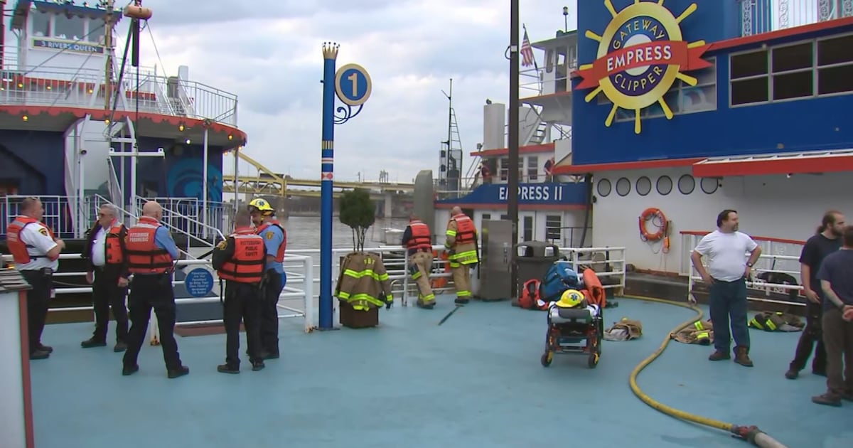 Boat damaged by fire at Gateway Clipper dock in Station Square