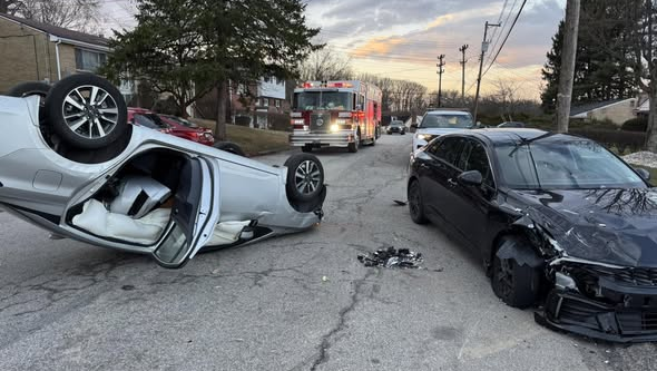 Vehicle crashes into parked car, rolls over in Penn Hills