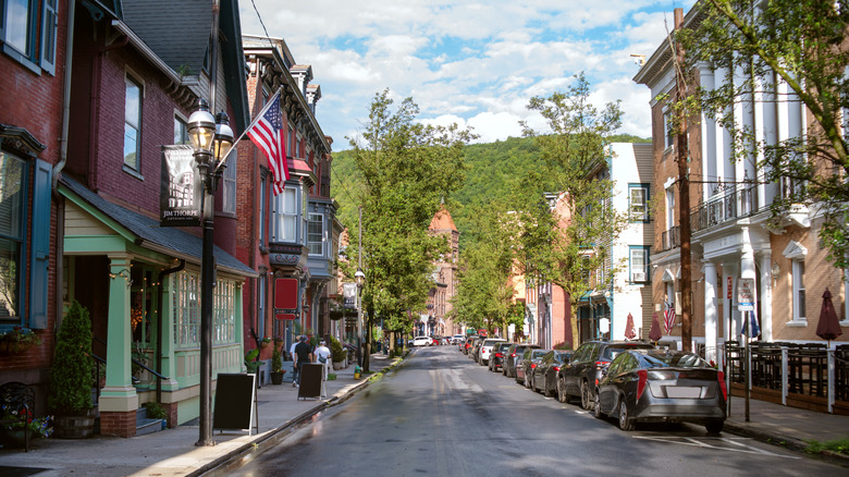 A street lined with Victorian architecture on a sunny day in Jim Thorpe, PA