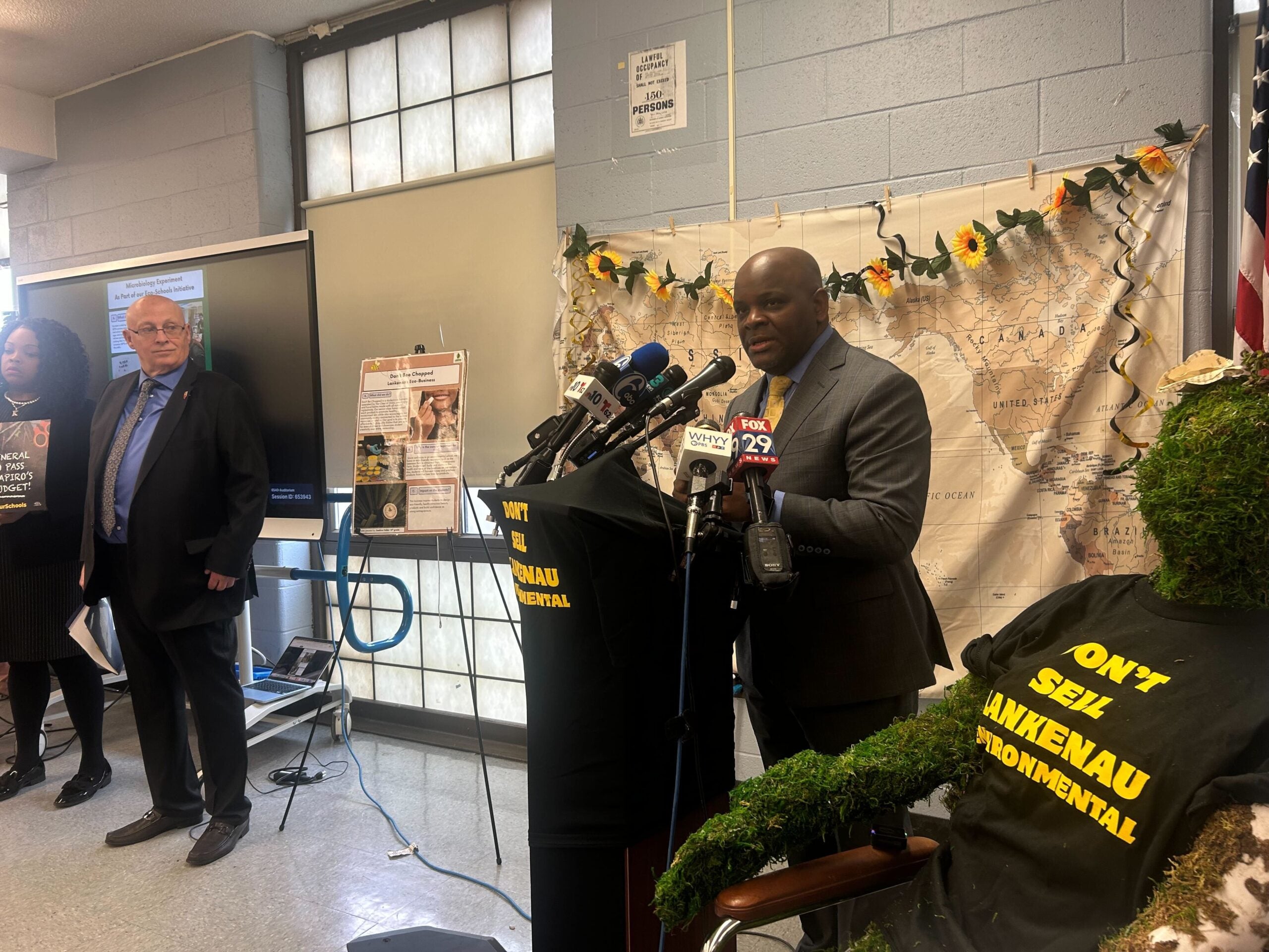 Jermaine Dawson speaks at a podium