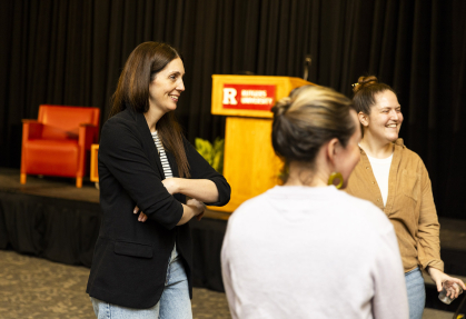 Author Liz Moore speaks with attendees, two of whom are pictured, ahead of her Rutgers–Camden talk. 