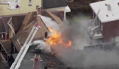 Crews battle flames in Glassport as smoke pours from home