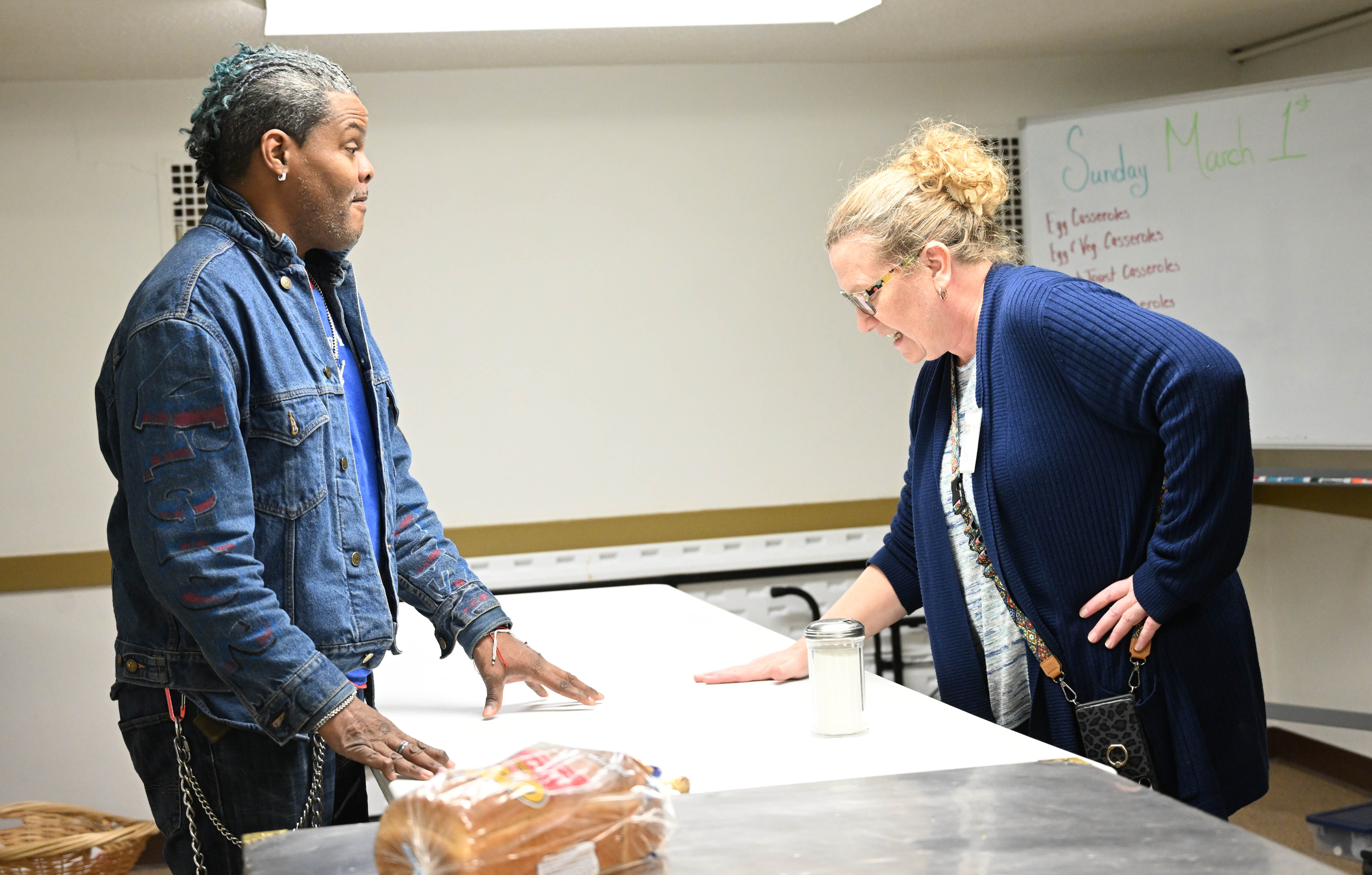 Neighborhood House coordinator Shellie Frichtman speaks Sunday, March, 1, 2026,...