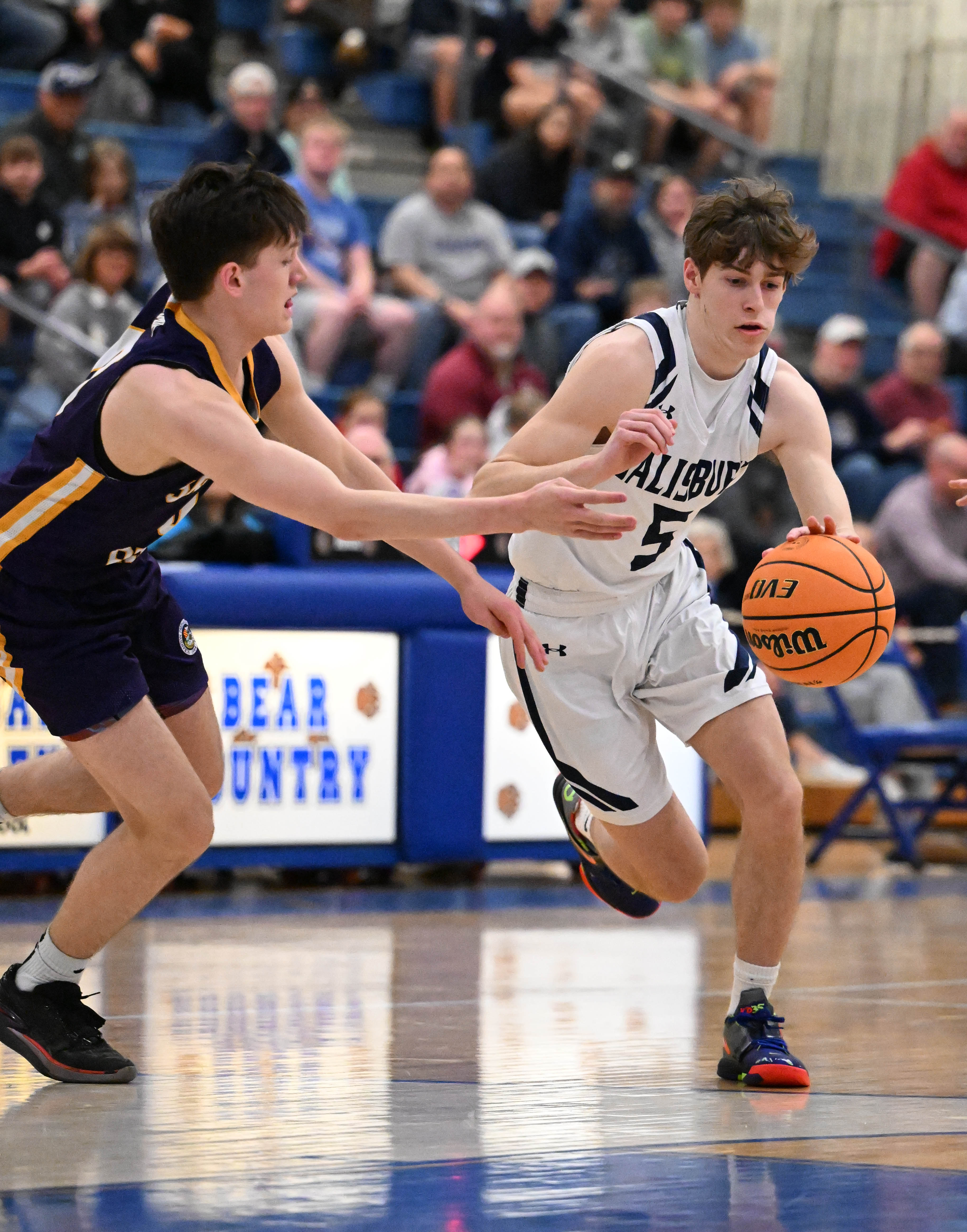 Salisburyâs Drew Petrie drives down the court Tuesday, March 10,...