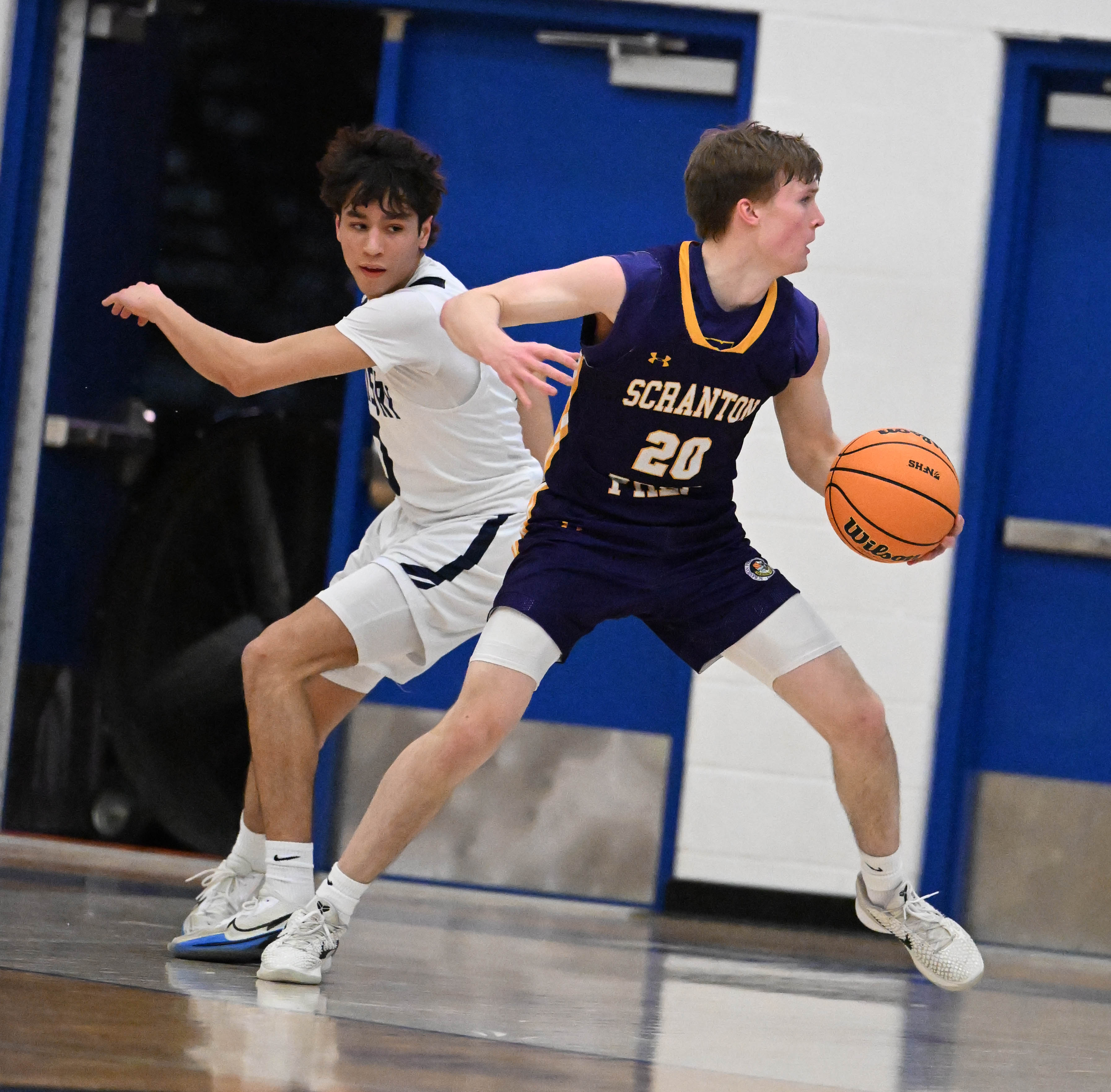 Scranton Prepâs Packy Doherty drives down the court Tuesday, March...