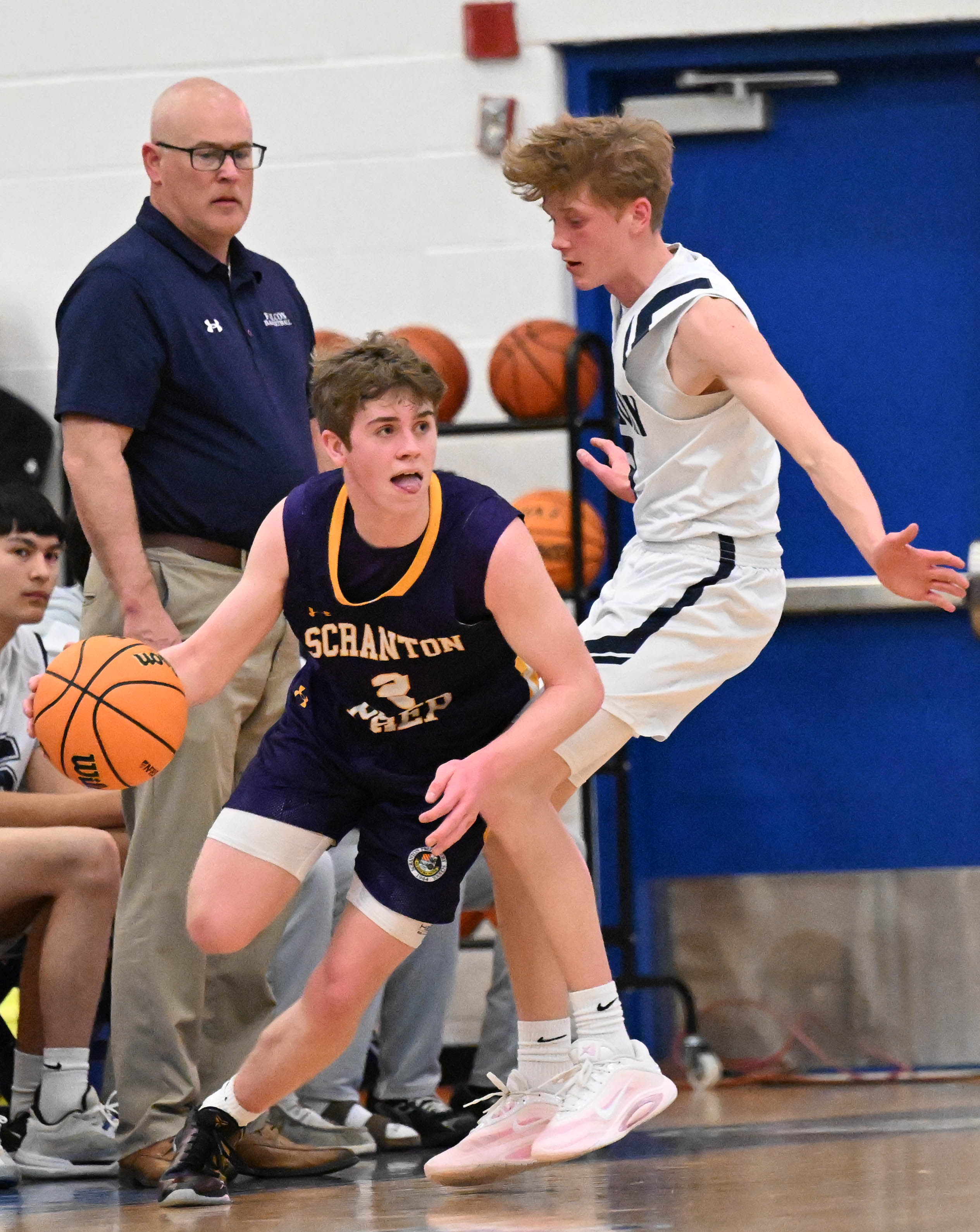 Scranton Prepâs Brody Martin drives down the court Tuesday, March...