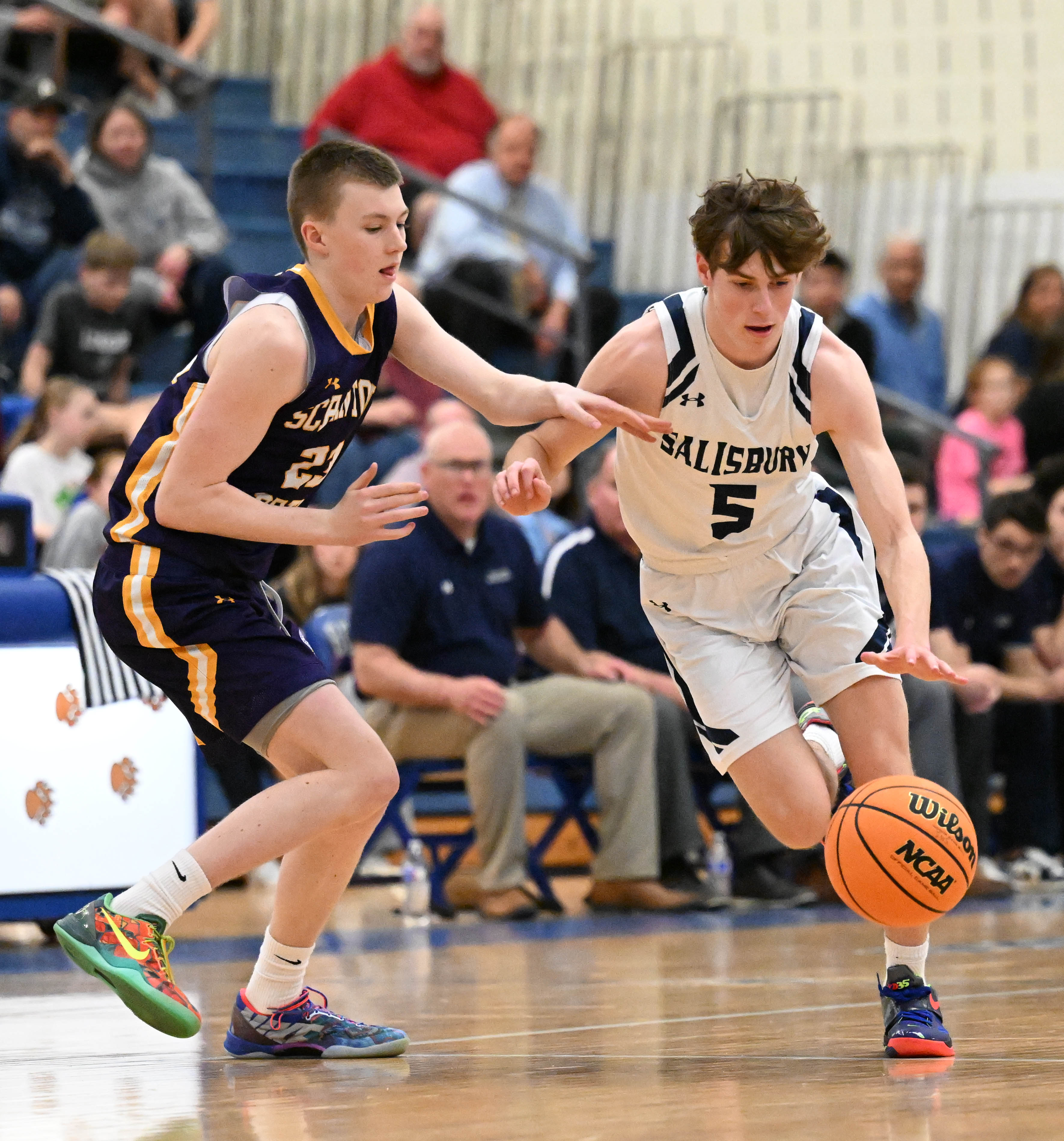 Salisburyâs Drew Petrie drives while Scranton Prep’s Jimmy Doherty defends...