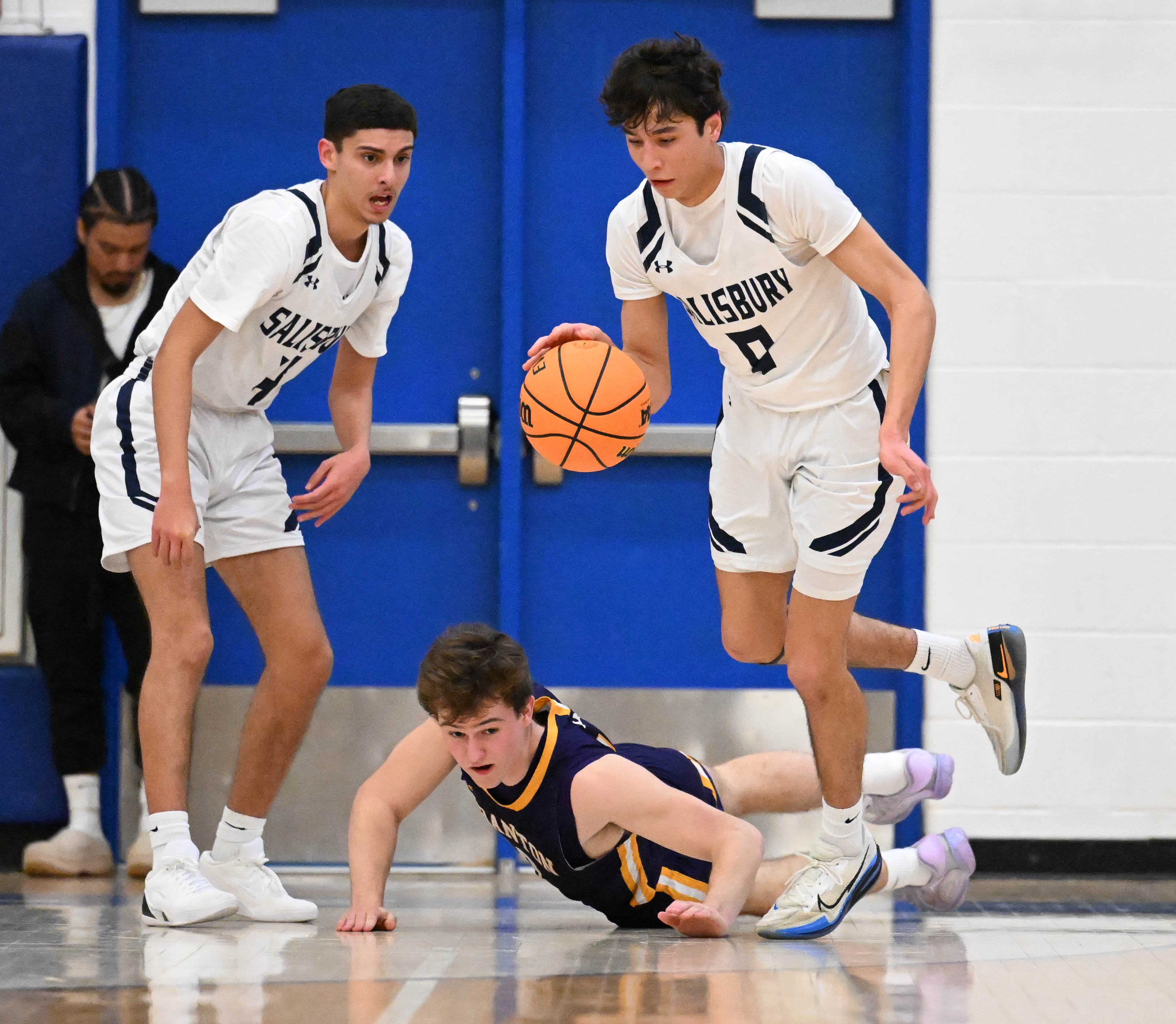 Salisburyâs Steven Lozada drives down the court during a game...