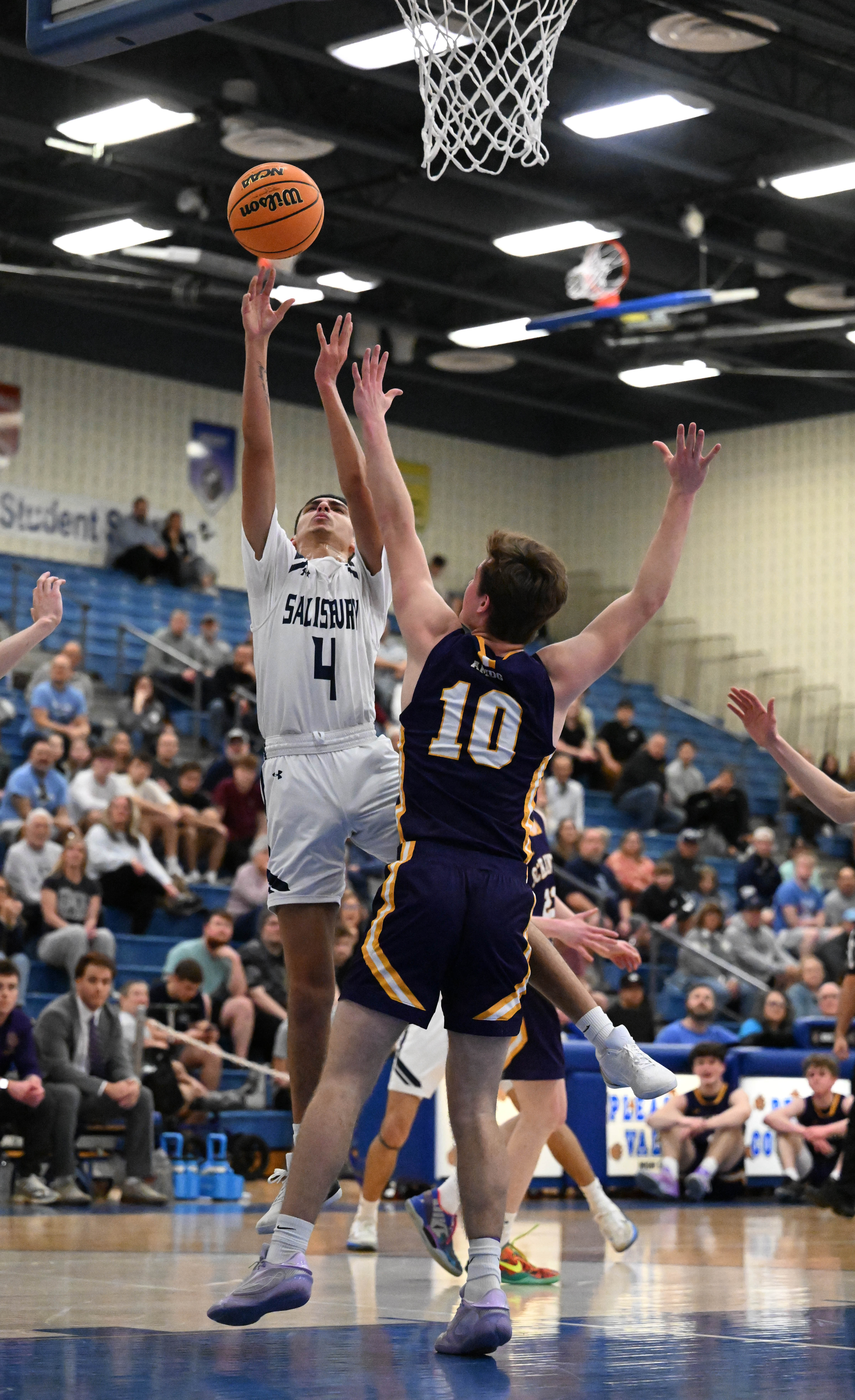 Salisburyâs Bryan Gonzalez shoots over Scranton Prep’s Liam Haggerty on...