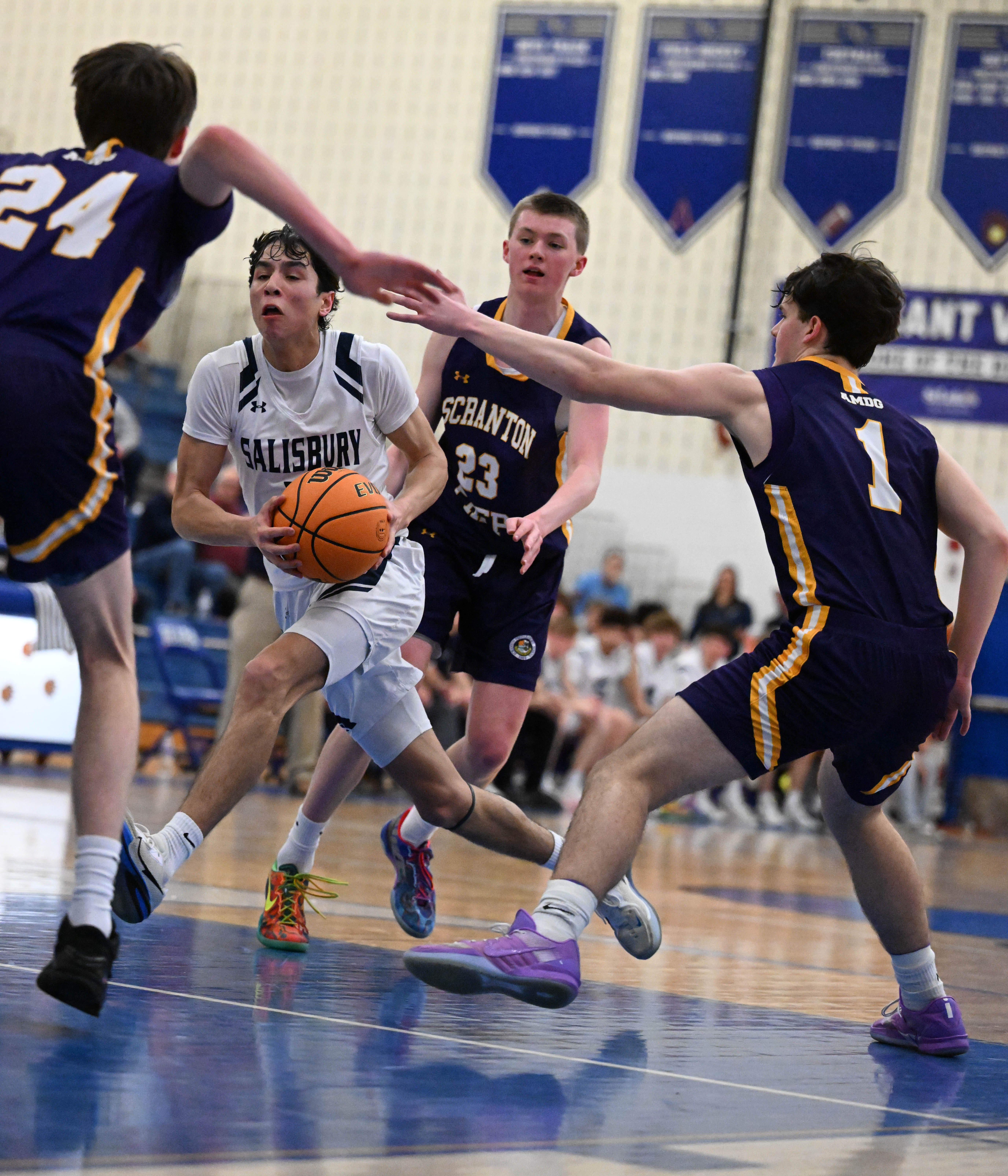 Salisburyâs Steven Lozada drives down the court Tuesday, March 10,...