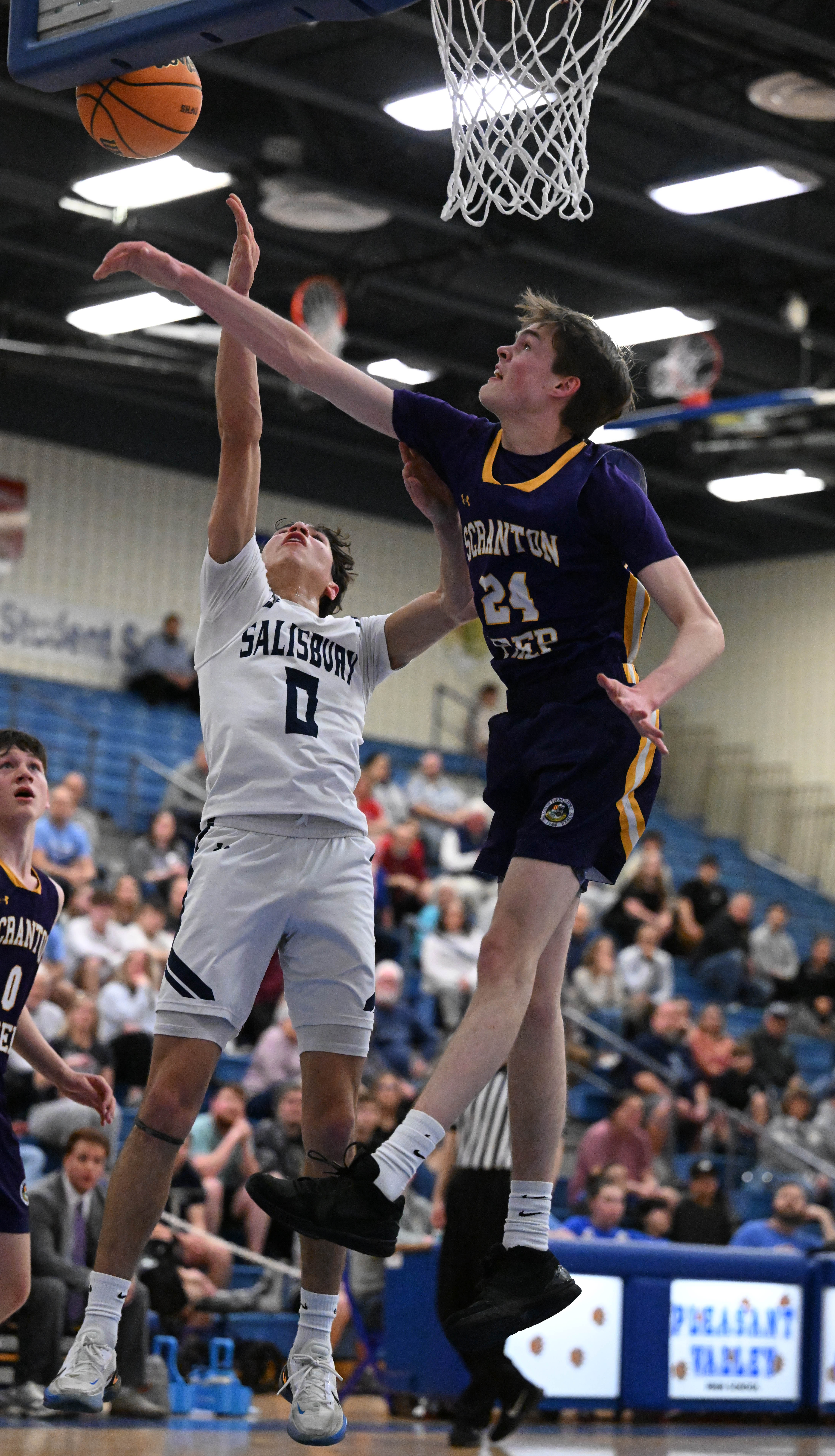 Scranton Prep’s Charlie Skoff defends Steven Lozada on Tuesday, March...