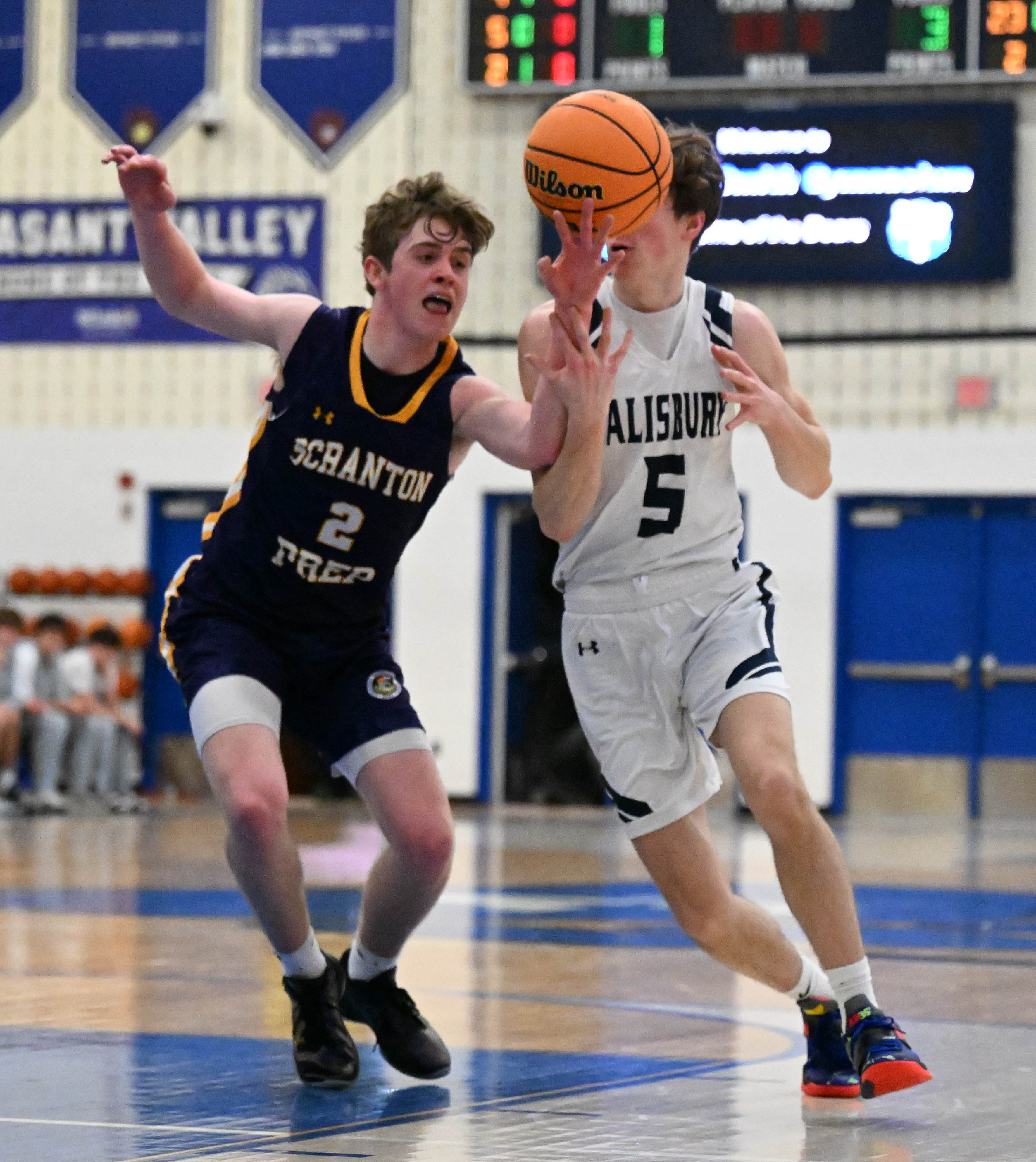 Salisburyâs Drew Petrie drives past Brody Martin on Tuesday, March...