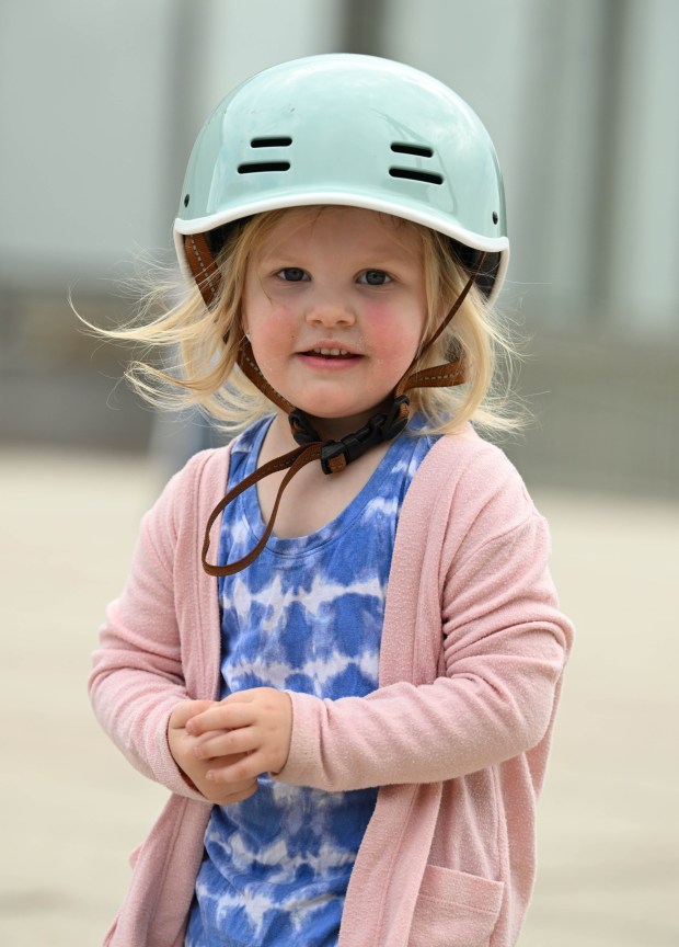 Robin White, 2, grabs a snack Wednesday, March 11, 2026, at Payrow Plaza in Bethlehem. (Amy Shortell/The Morning Call)