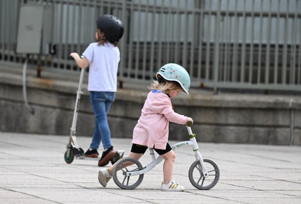 Robin White, 2, rides her balance bike Wednesday, March 11, 2026, at Payrow Plaza in Bethlehem. (Amy Shortell/The Morning Call)