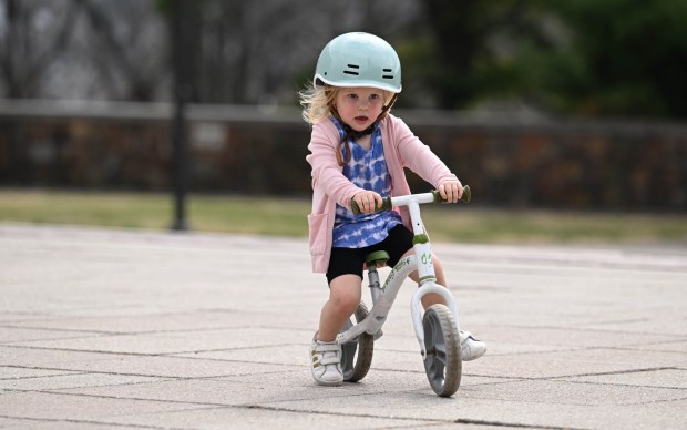 Robin White, 2, rides her balance bike Wednesday, March 11, 2026, at Payrow Plaza in Bethlehem. (Amy Shortell/The Morning Call)