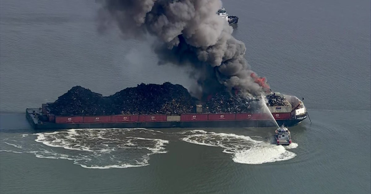 Delaware River barge fire: Crews tackle fire on scrap metal barge
