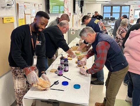people making sandwiches