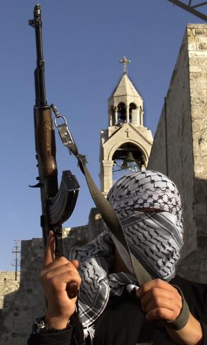 A masked Palestinian