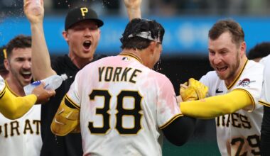 Apr 4, 2026; Pittsburgh, Pennsylvania, USA;  Pittsburgh Pirates designated hitter Nick Yorke (38) and celebrates with Pittsburgh Pirates pitcher Mitch Keller (left) and right fielder Ryan O'Hearn (29) after Yorke hit  a game winning walk-off single to defeat the Baltimore Orioles in the ninth inning at PNC Park. Mandatory Credit: Charles LeClaire-Imagn Images