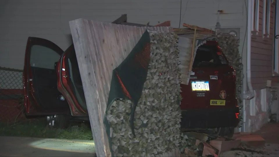 A stolen vehicle smashed through a fence near a house in Pittsburgh on Tuesday.